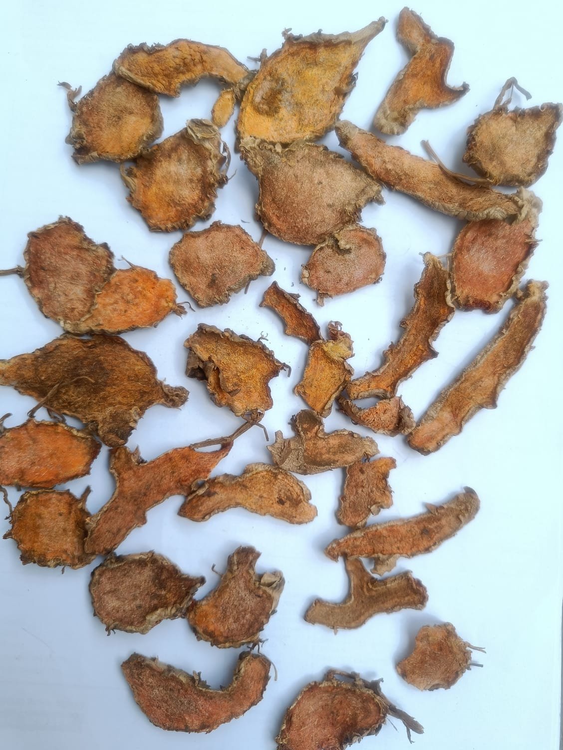 Ground Lakadong turmeric powder sample being weighed on a laboratory scale before curcumin extraction